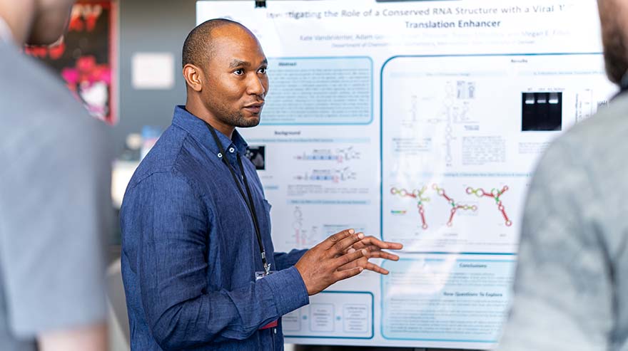 MSU Denver undergraduate students present research posters at the annual research symposium last spring.