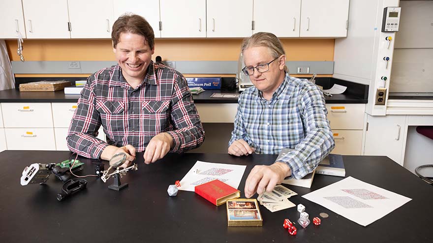 Brothers Jon Dyhr, left, assistant professor in the biology department, and Ben Dyhr, professor in mathematics and statistics