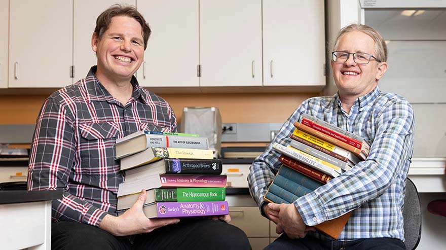 Brothers Jon Dyhr, left, assistant professor in the biology department, and Ben Dyhr, professor in mathematics and statistics