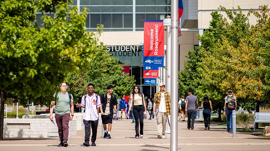 Students walk on campus on the first day of the fall semester