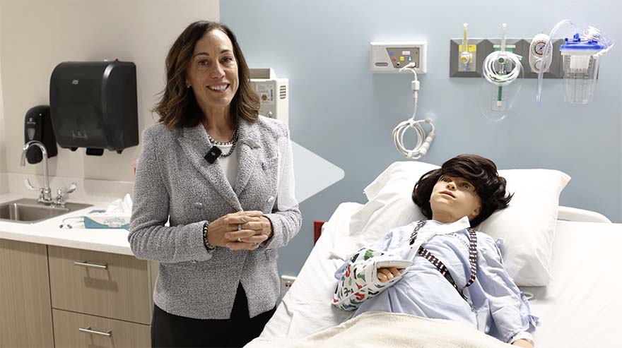 President Janine Davidson, Ph.D., checks out the new Gina and Frank Day Health Institute