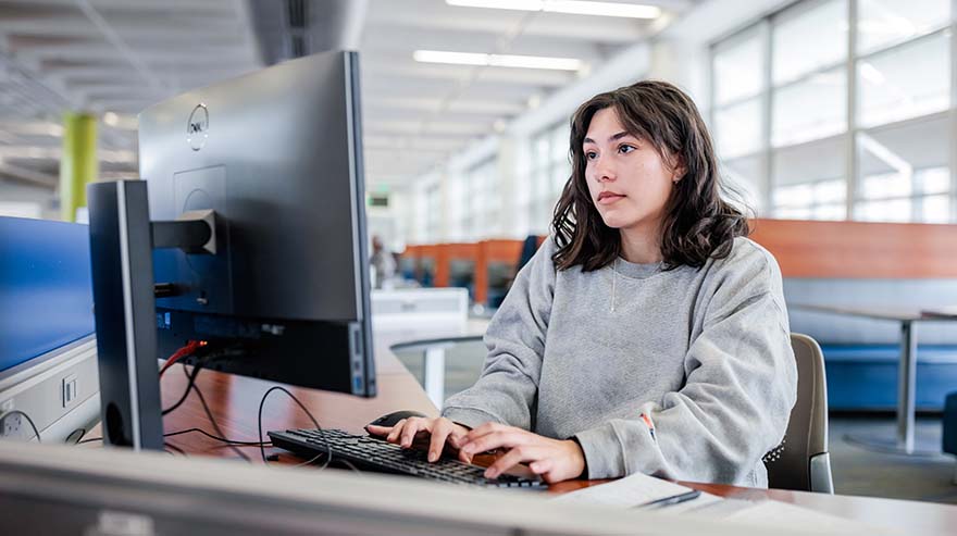 MSU Denver student Abrianna Mangiamele works on a computer.