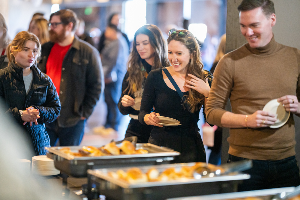 Employees enjoy a buffet