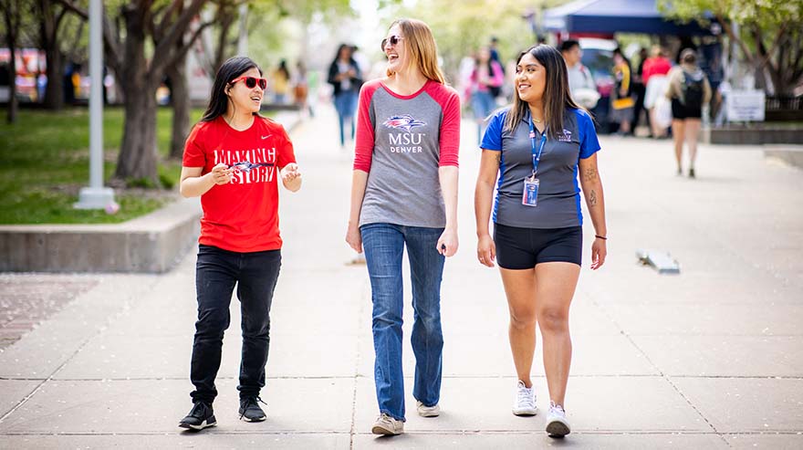 Students walk on campus in spring 2024