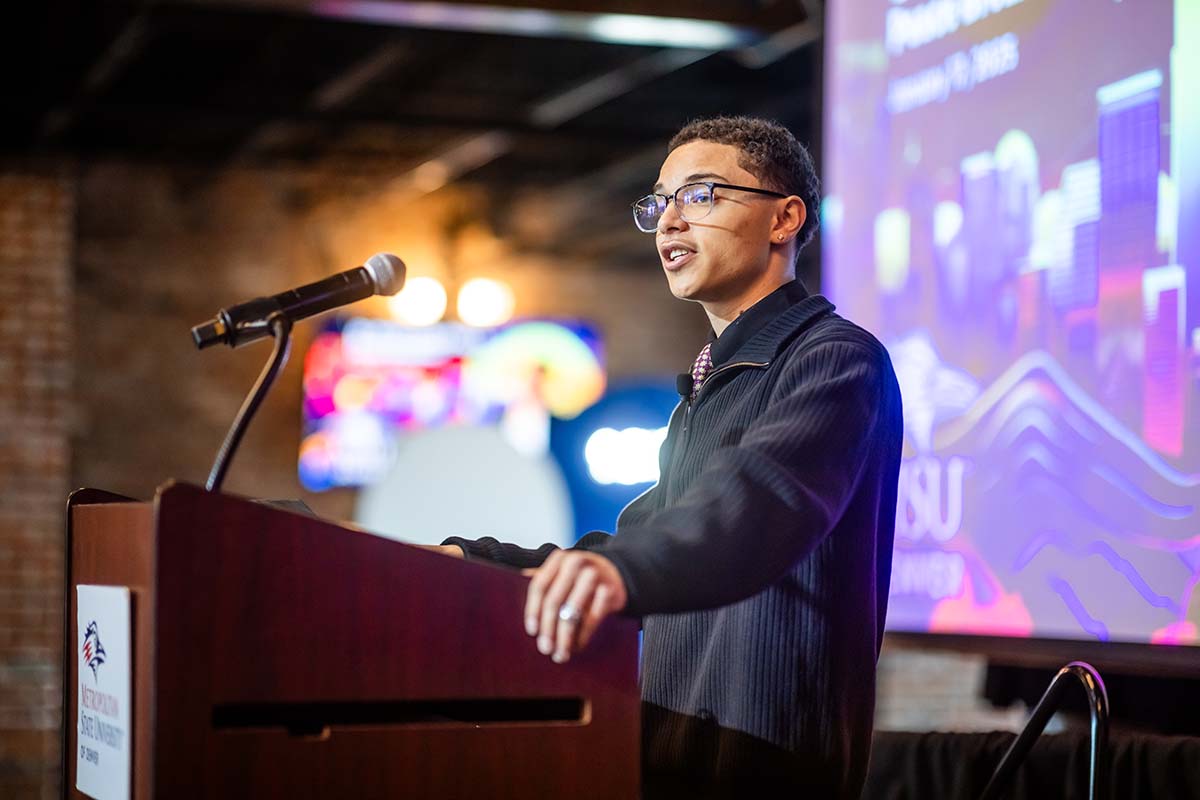 MSU Denver student Cy Holt speaks during the event.