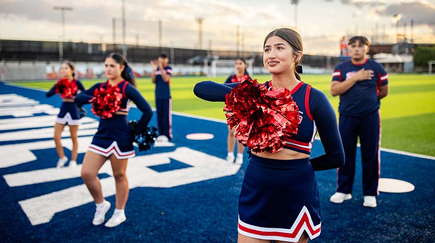 The Cheer Team performs at the Homecoming Tailgate