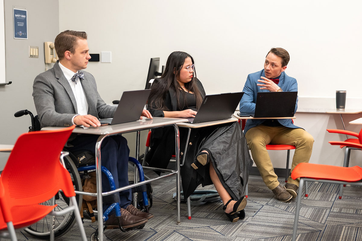 MSU Denver Debate students Benjamin Pexton, Alliton Flores Sanchez, and Aksel Silva respond to the competing groups counter statements.