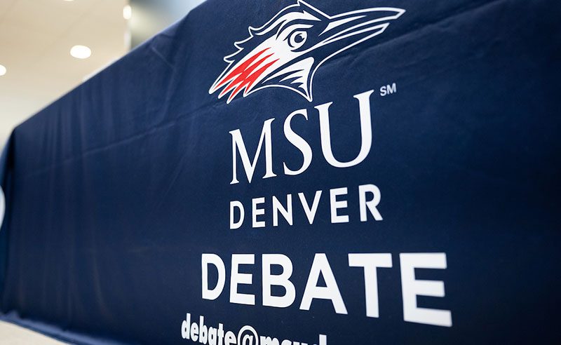 A banner with the MSU Denver logo and the word Debate