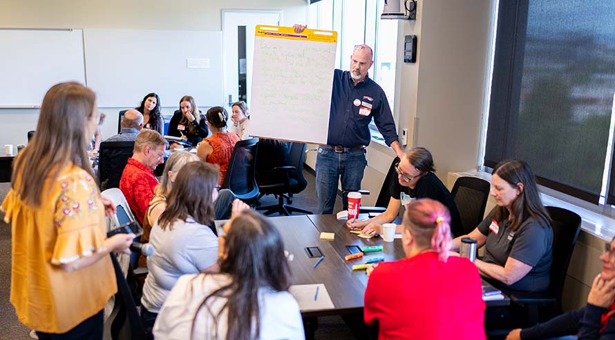 Faculty, staff, chairs, deans, and senior leaders participate in the community circle “Defining a culture of belonging at MSU Denver” at the Community Collab Summit.