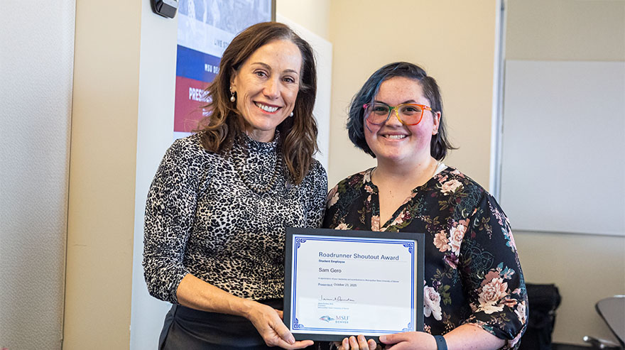 Dr. Janine Davidson presents the Roadrunner Shoutout Award to Sam Gero.