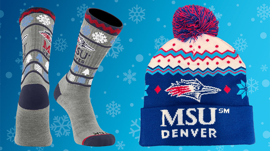 A pair of gray MSU Denver winter socks and a blue, white, and red MSU Denver knit beanie with a pom-pom displayed on a blue background with snowflakes.