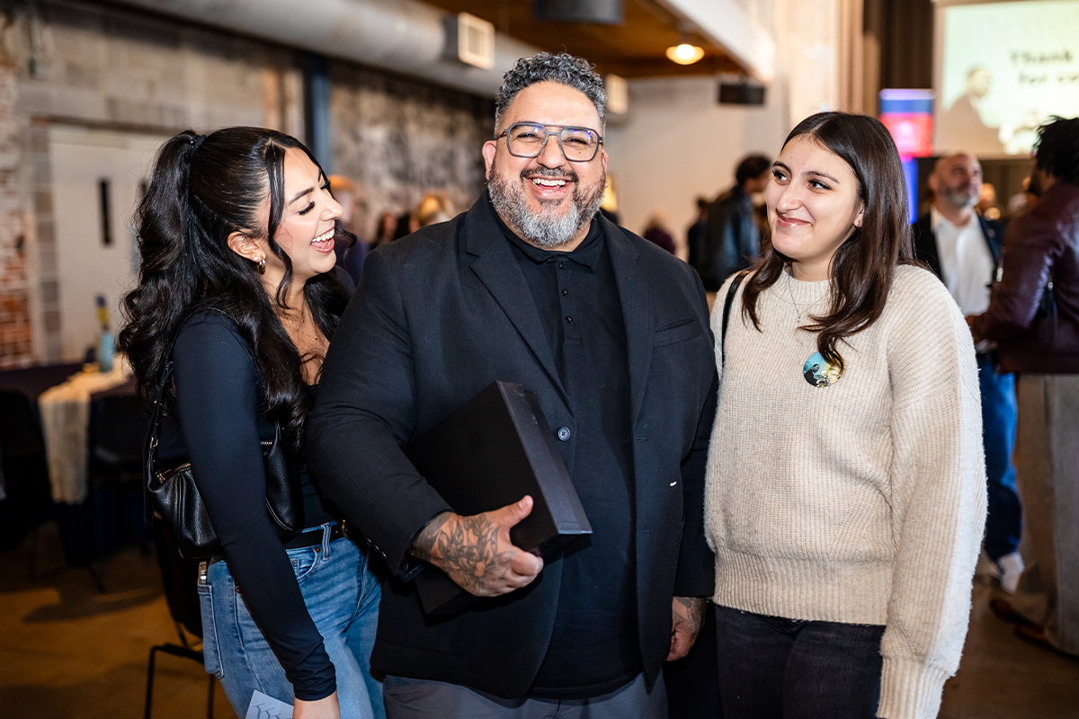 Highlights from the MLK Peace Breakfast, including speakers on stage and attendees participating in the event