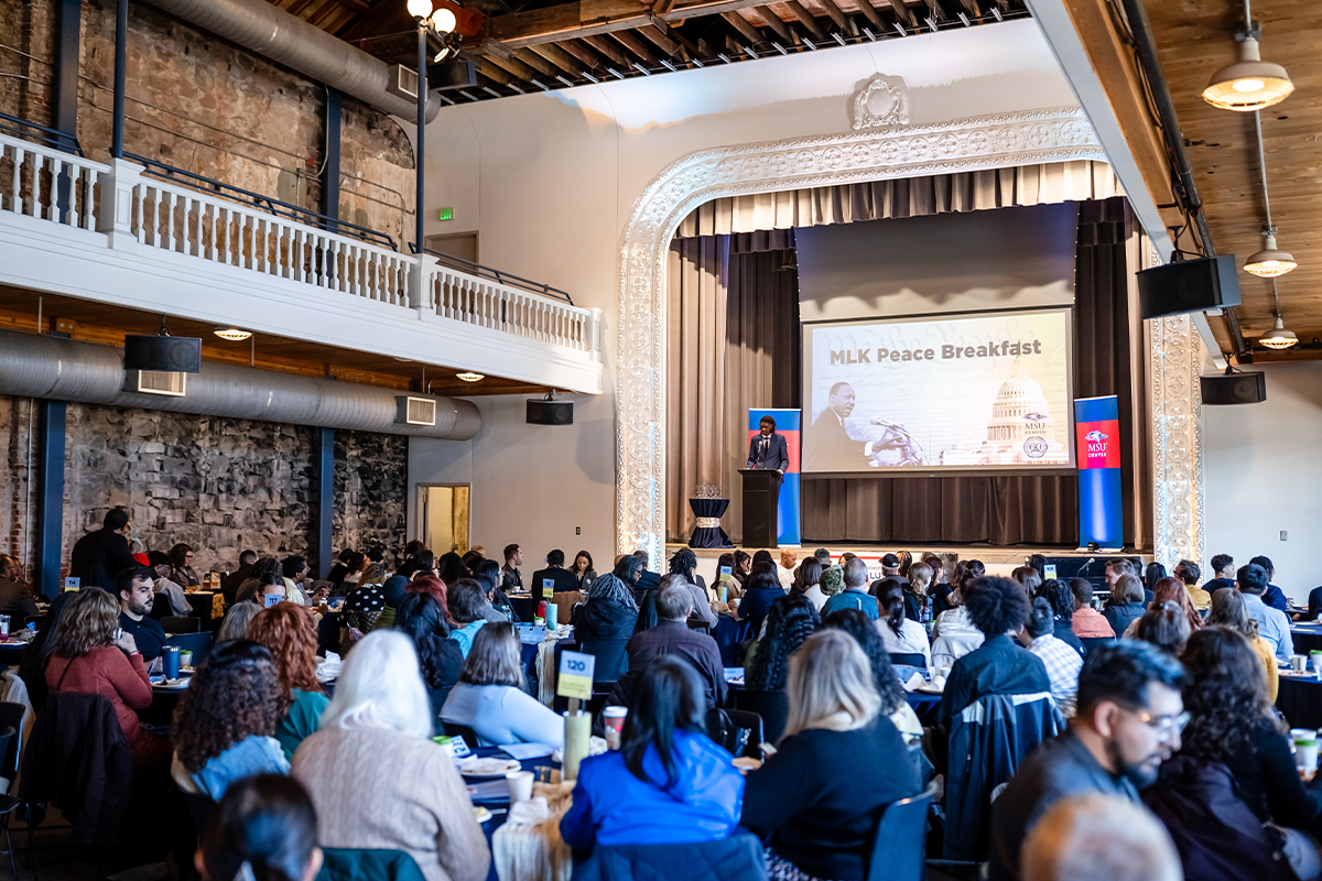 Highlights from the MLK Peace Breakfast, including speakers on stage and attendees participating in the event