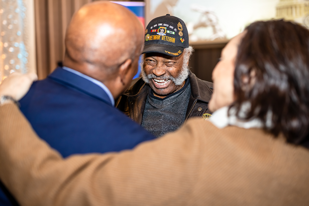 Highlights from the MLK Peace Breakfast, including speakers on stage and attendees participating in the event