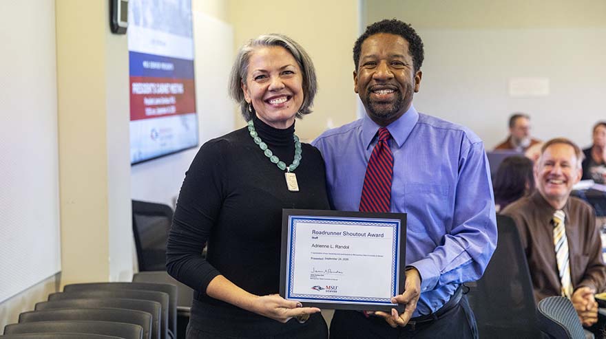 Chief of Staff Edward Brown, Jr., with Roadrunner Shoutout Award staff winner Adrienne Randol
