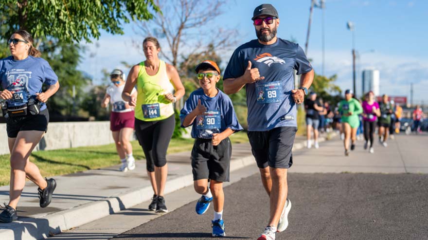 Roadrunners run through the Auraria Campus at the 10th annual Roadrunners 5k