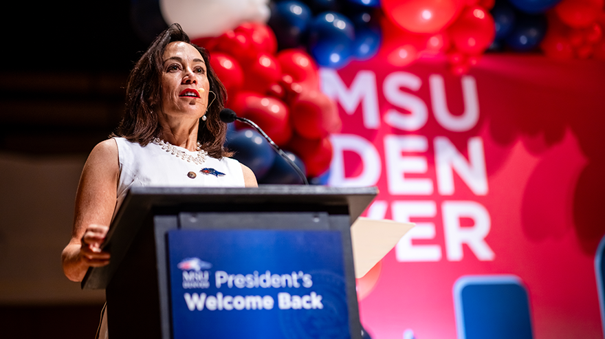 President Davidson at a lectern