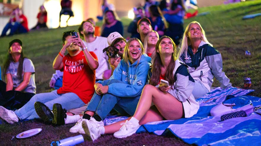 MSU Denver students watch the post soccer game drone show.