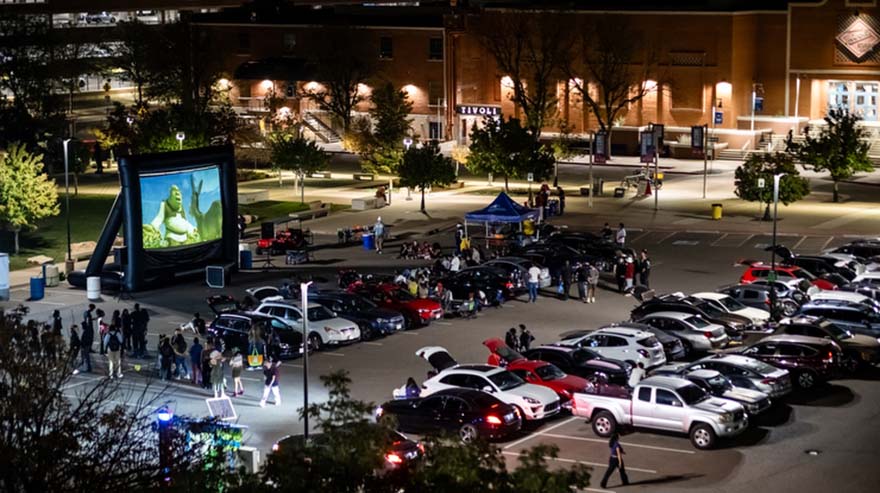 Moviegoers watch Shrek.