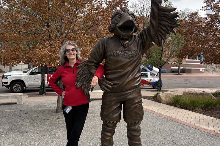 Beth Christensen with Rowdy statue on Auraria Campus