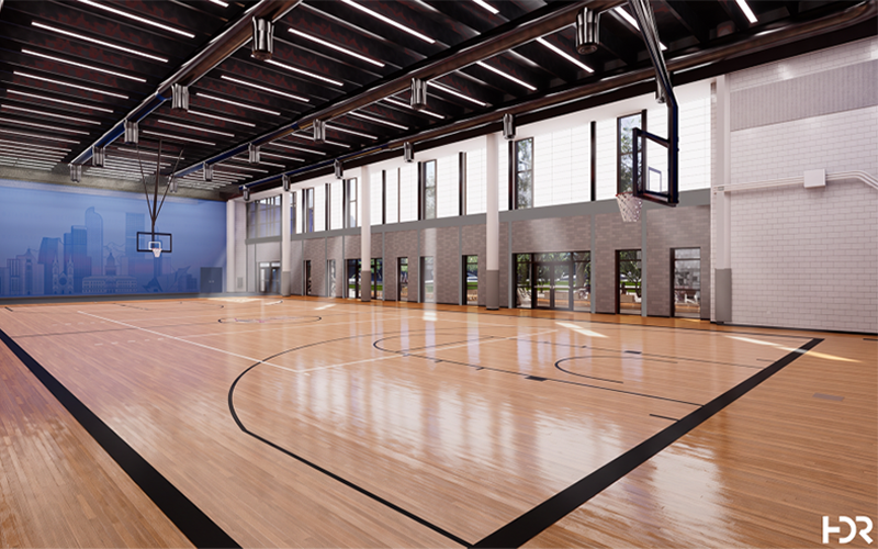 A rendering of a large room shows a basketball court and high windows