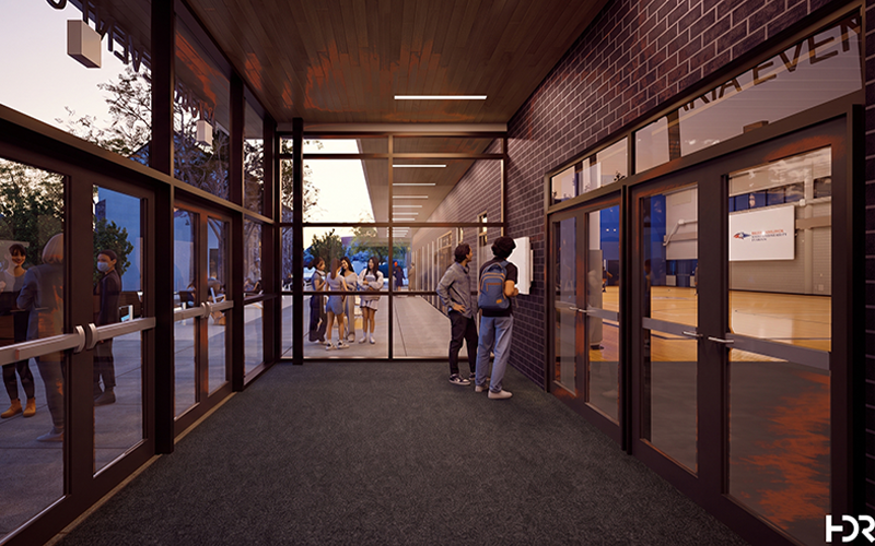 A rendering shows people standing in the renovated lobby of the Auraria Event Center, including windows that look out toward campus