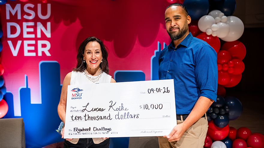 Flywheel Challenge winner Lucas Koike with MSU Denver President Janine Davidson